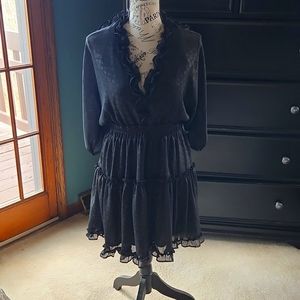Black dress with gold accents.